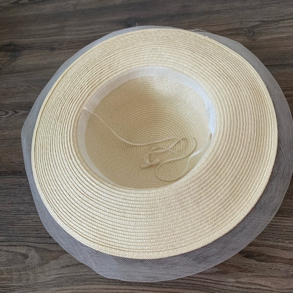 Elegant Cream Wide-Brim Hat with Floral Accent - Picture 9 of 9